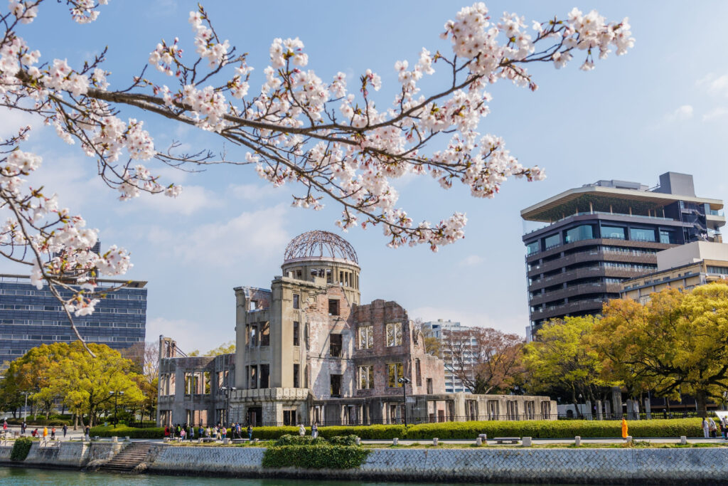 Famous Places to Visit in Hiroshima for a Historic Journey Hiroshima Peace Memorial Park with the Atomic Bomb Dome and blooming cherry blossoms