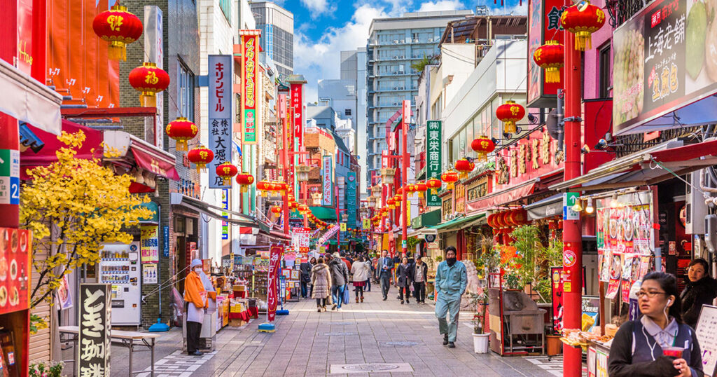 Kobe city skyline with Mount Rokko in the background and Kobe Port Tower illuminated at night